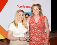 Active Schools Sports Development Volunteer Awards 2023. Councillor Francesca Brennan presenting a trophy to winner Sophie Harrison.